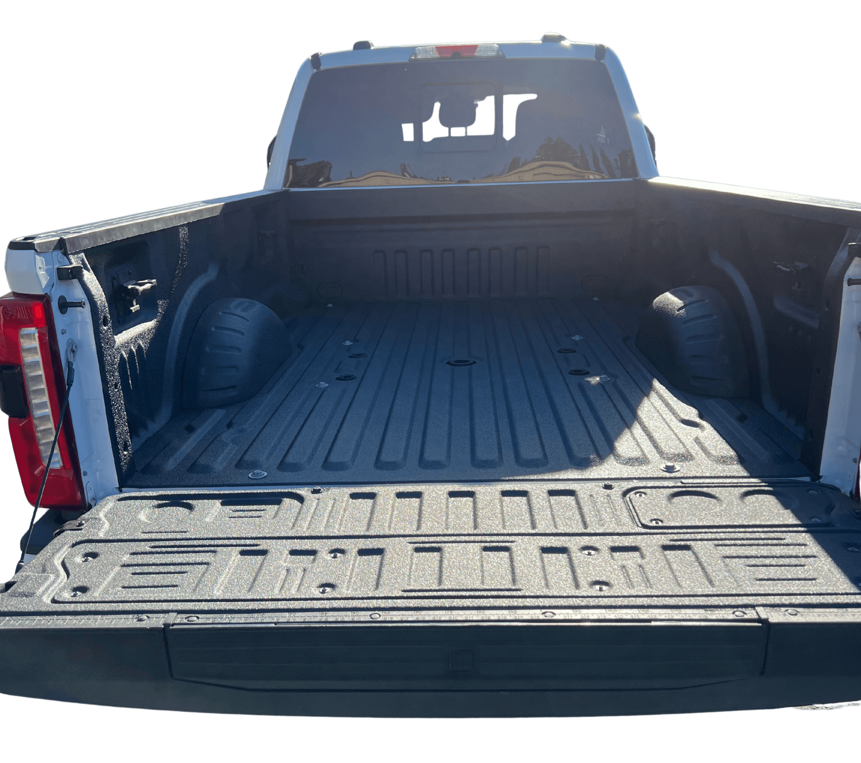 Truck bed with spray-in liner